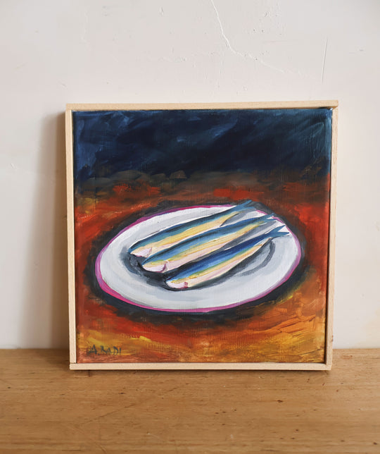 tre sardine sul piatto (three sardines on plate)