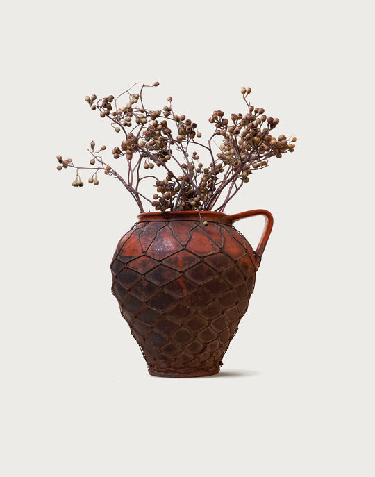 Antique Oversized pitcher with Wire Netting