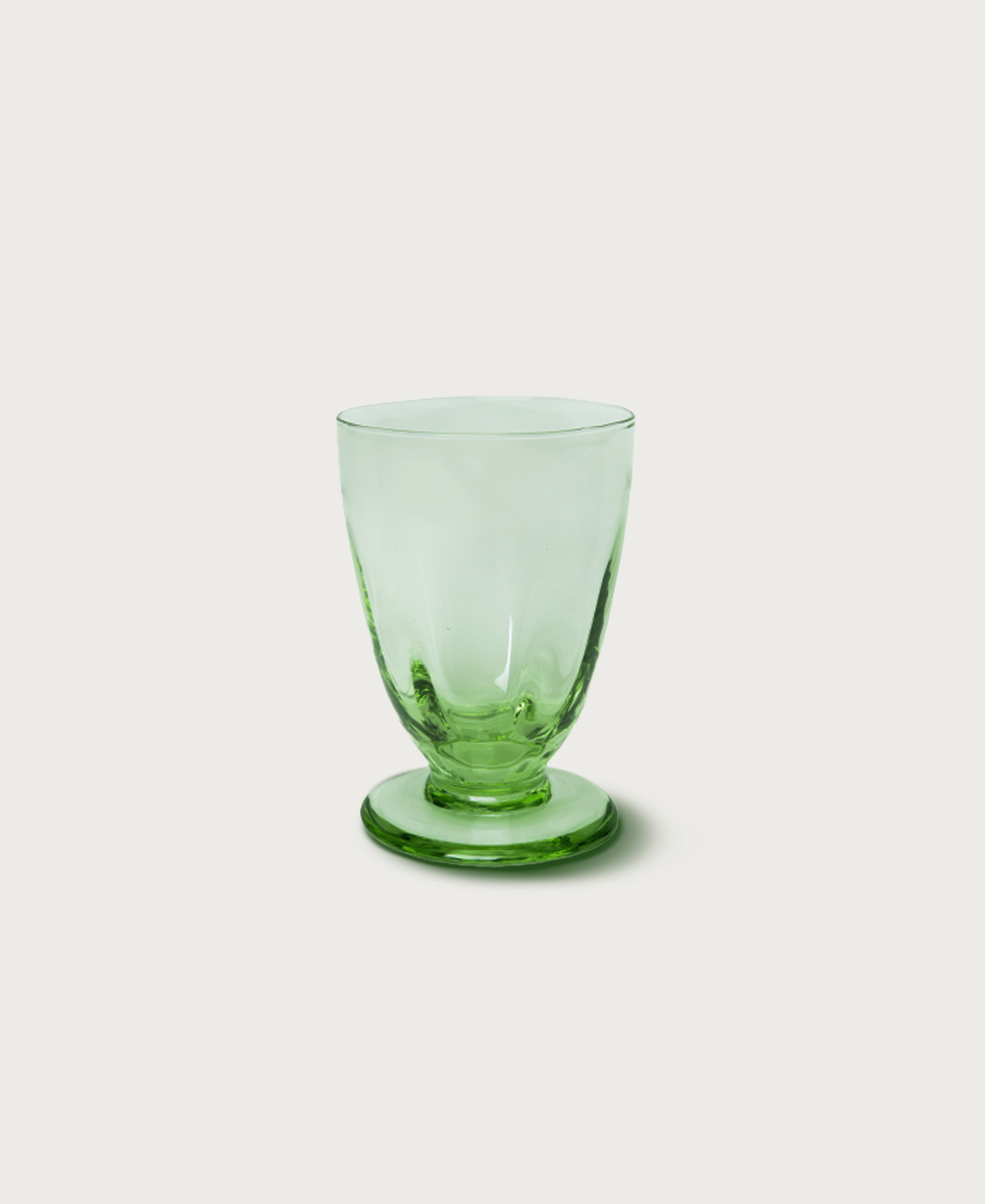 https://ilbucovita.com/cdn/shop/products/il-buco-vita-pienza-footed-glass-green-lr.jpg?v=1661811031
